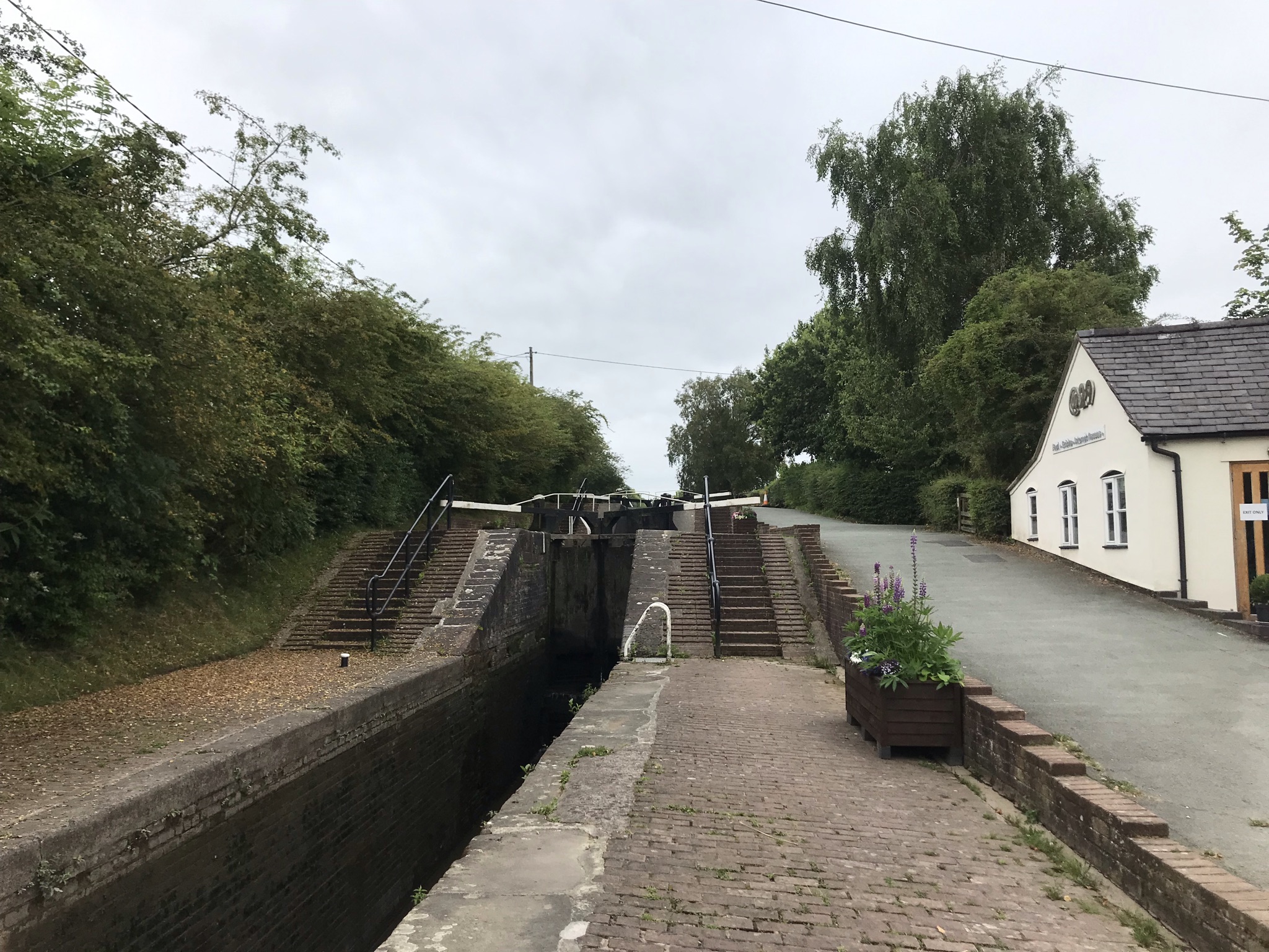 A lock with the water at the lowest level showing how deep it is.